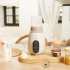 Babymoov NutriSmart 5-в-1 затоплящ уред и стерилизатор за шишета за дома и колата, минерално бежов - 4